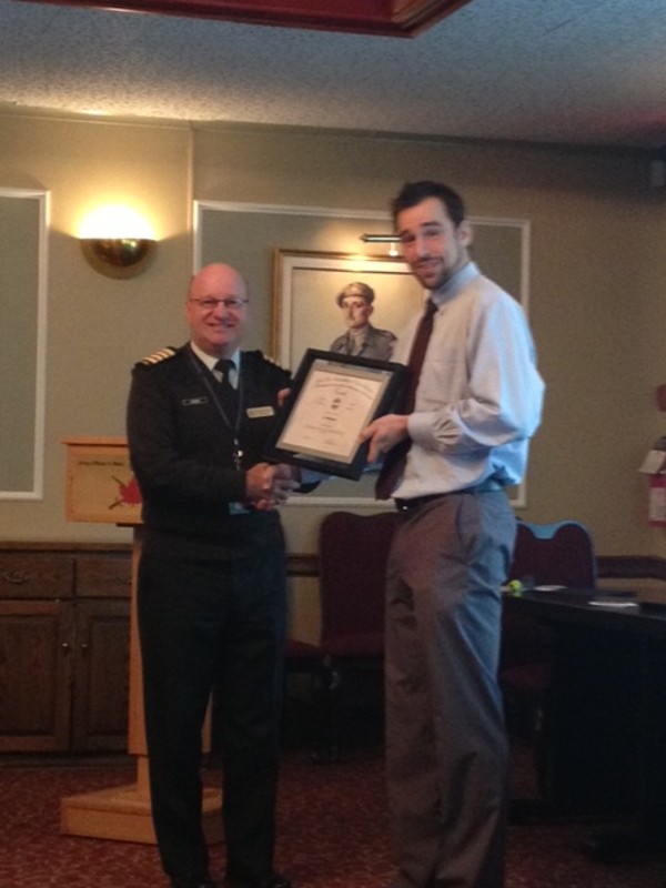 Col. Martin Girard, DND(CFSSG), chapter president, presents a token of appreciation to Luc Beaudoin, chief of cyber operations, Canadian Cyber Incident Response Centre – Public Safety Canada, in recognition of his speech at the January meeting.